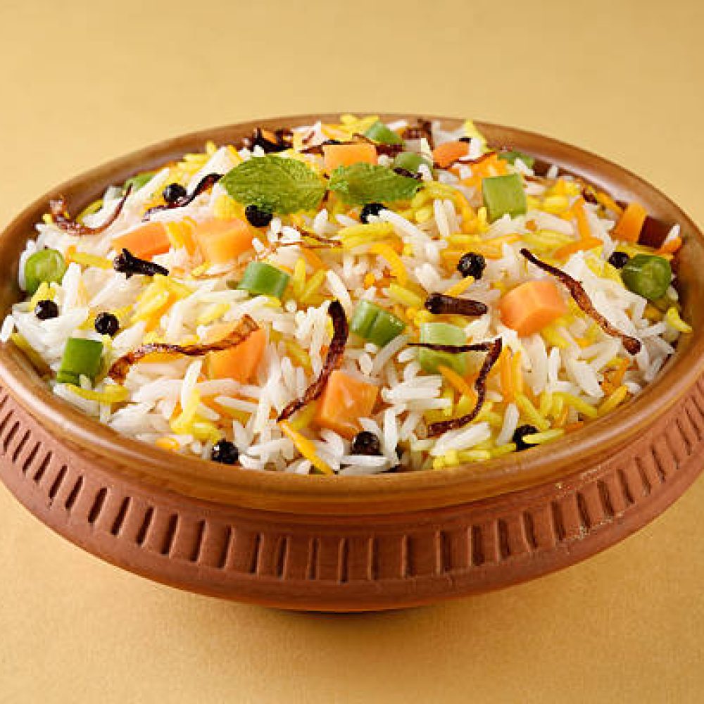 The Indian Pulav vegetables and The rice is browned in oil and then mixed with vegetables nuts, fruits etc. Basmati Rice,Vegetable Rice